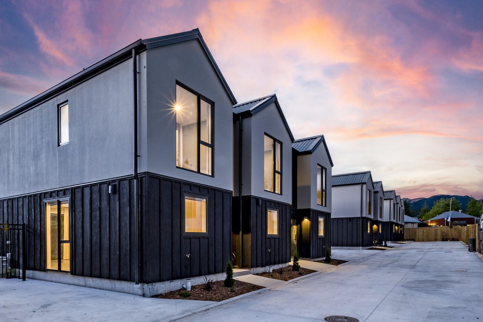 Jacks Pass development - modern townhouses at twilight