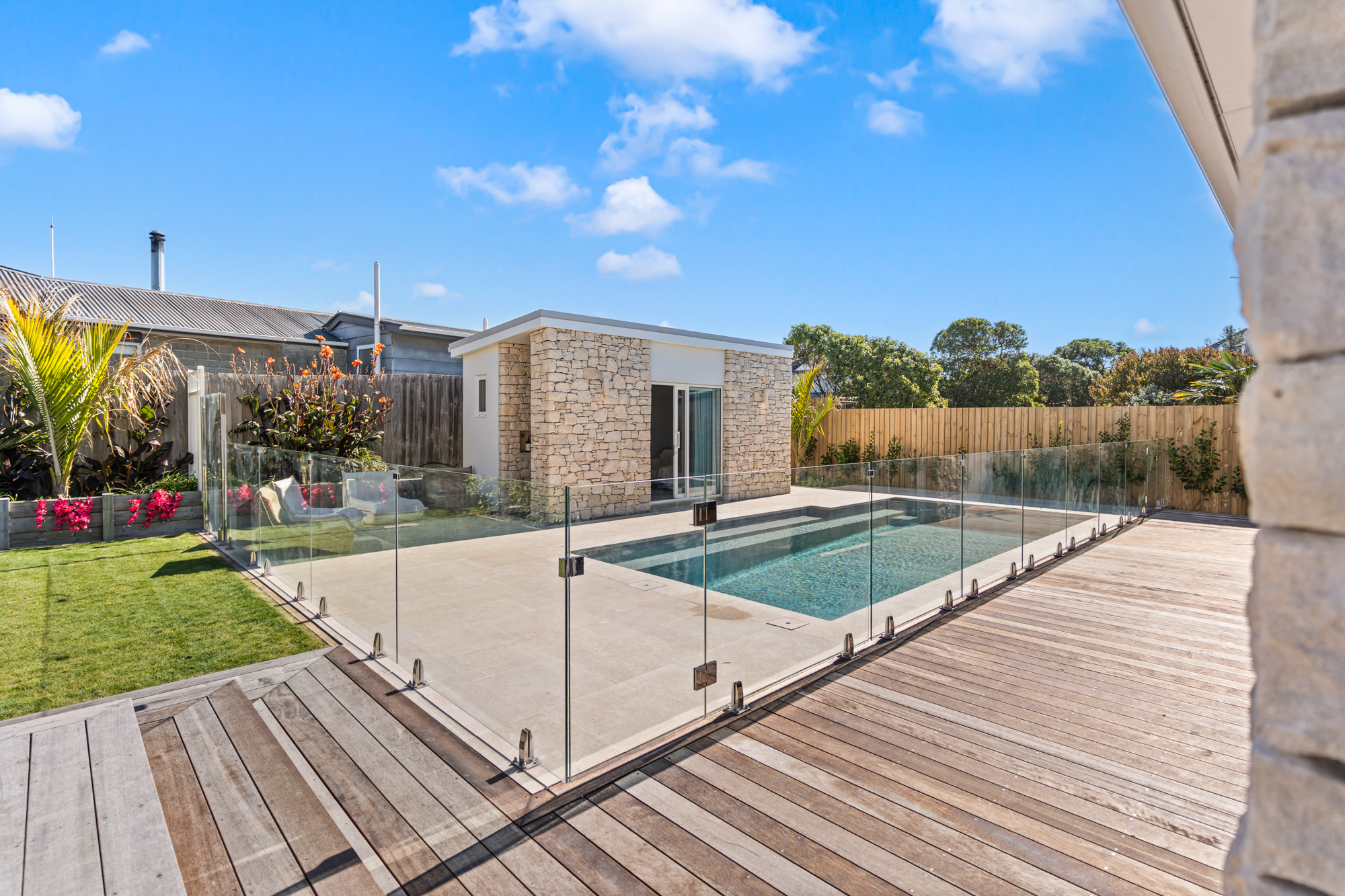 Marine Parade - swimming pool with frameless glass balustrade and timber decking