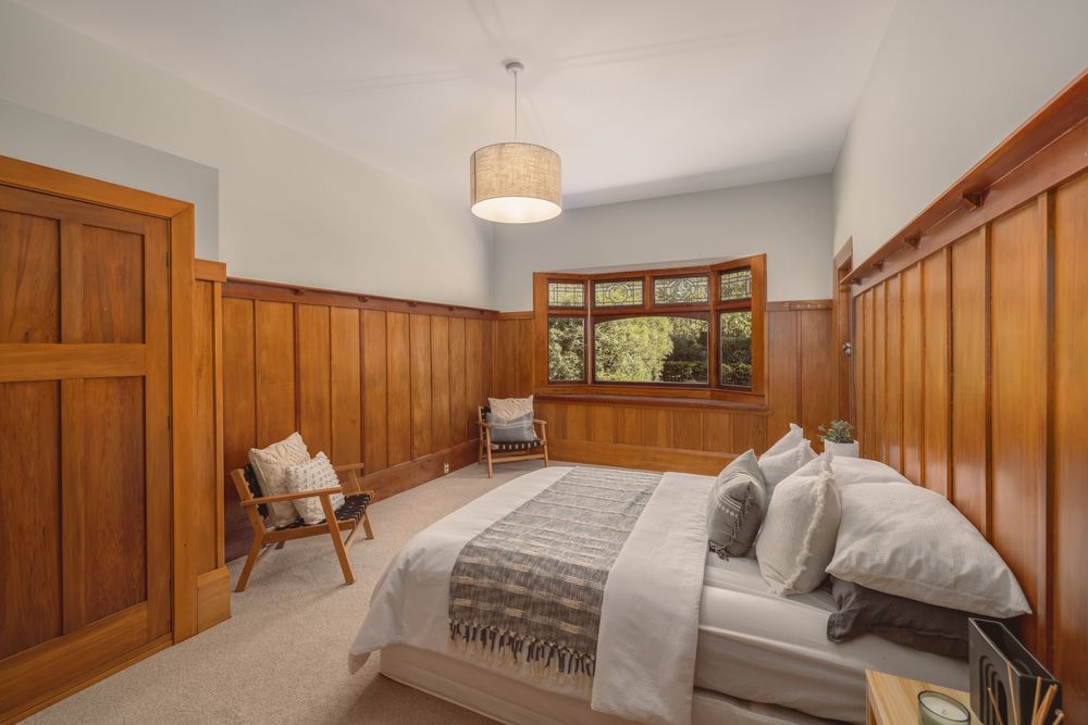Woodville Street bedroom with native timber panelling